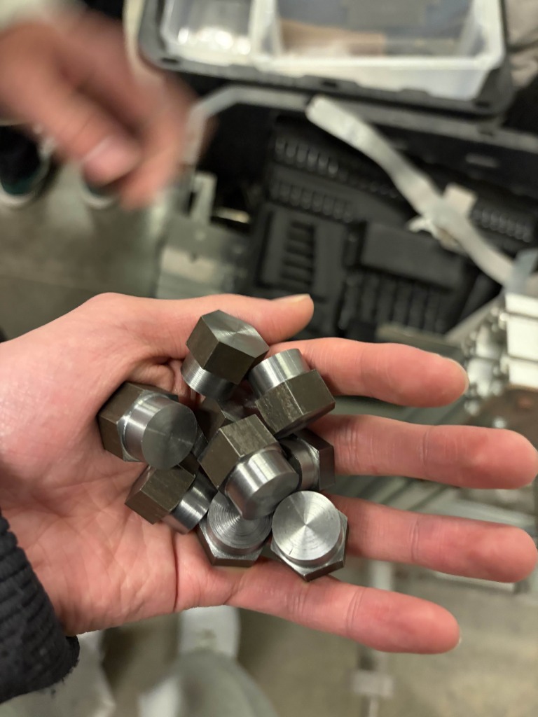 Batch of machined hex fasteners